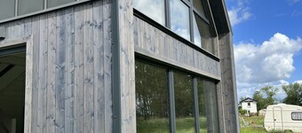 Gemütliches Holzhaus mit Garten nah am Wasser, Hundefreundlich