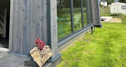 Gemütliches Holzhaus mit Garten nah am Wasser, Hundefreundlich