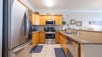 Fridge, microwave, cookware/dishes/utensils