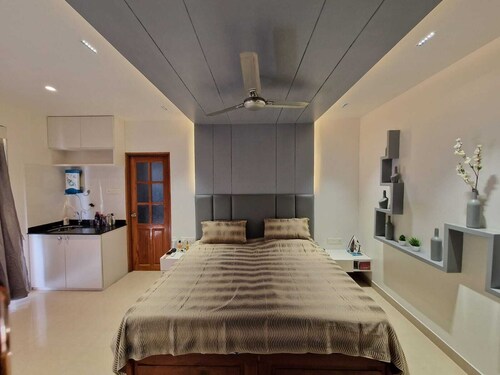 2 x King Size en suite bedrooms with wardrobes with  fridge and filtered water.
