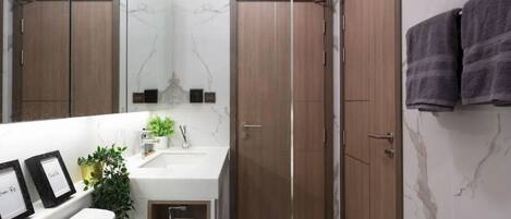 Hair dryer, towels, soap, shampoo