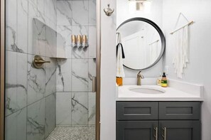 Hair dryer, towels, soap, shampoo