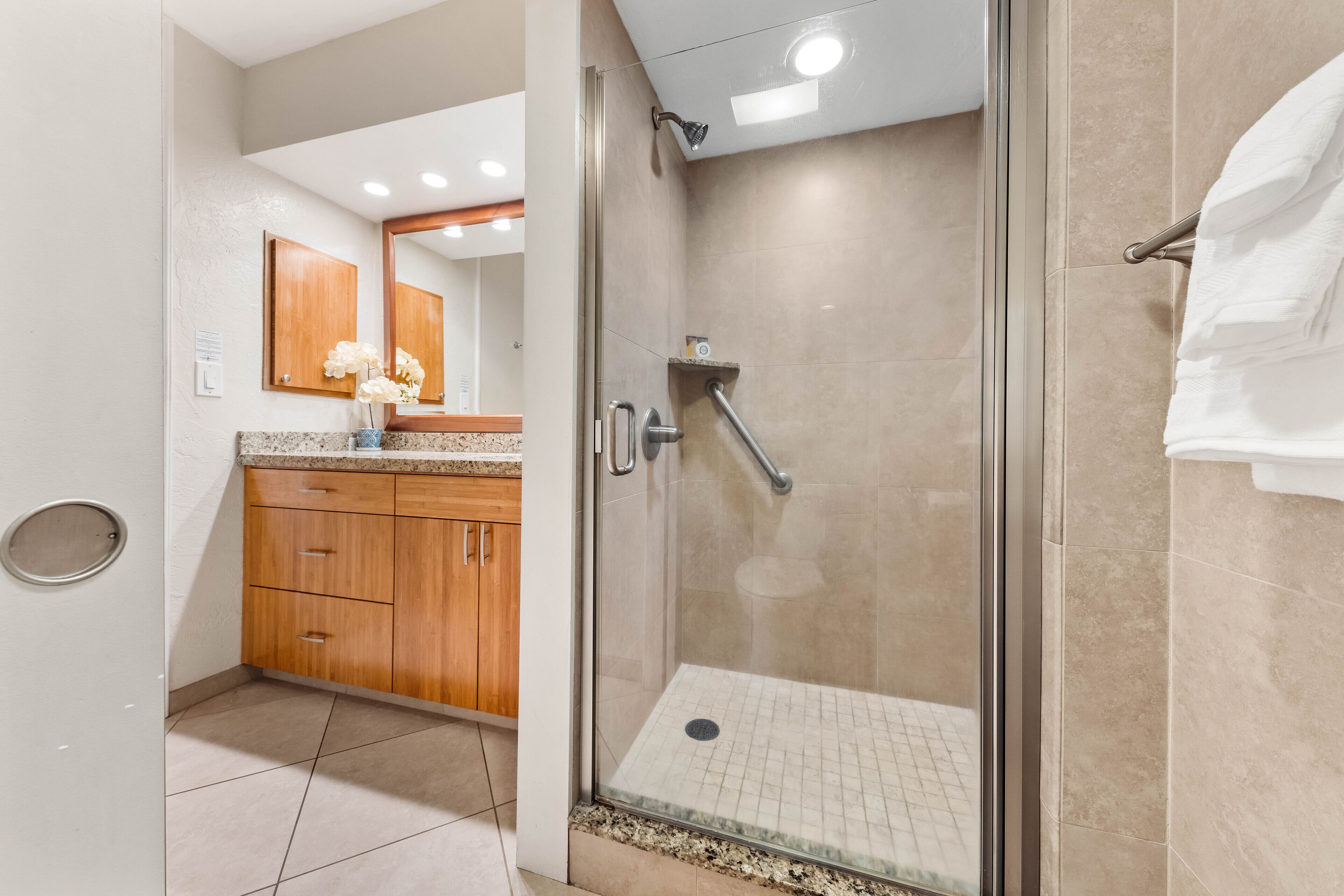 Shower, hair dryer, towels, shampoo