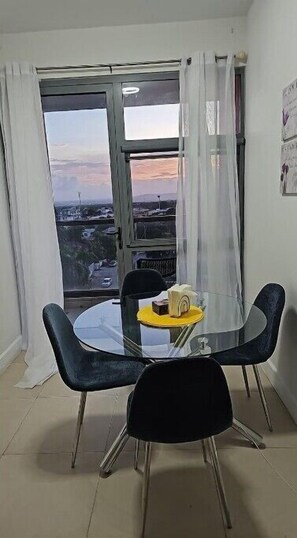Enjoy a city view from the balcony through the large sliding glass door.