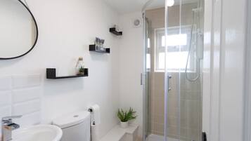 Hair dryer, towels, soap, toilet paper