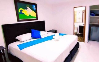 Deluxe Room | Minibar, in-room safe, blackout drapes, WiFi (free)