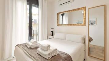 2 habitaciones, tabla de planchar con plancha y cuna de viaje