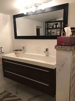 Hair dryer, towels, soap, shampoo