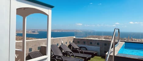 Outdoor pool, sun loungers