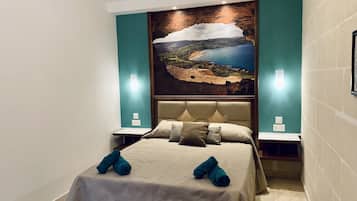 Habitación Deluxe | Sábanas de algodón egipcio, ropa de cama de alta calidad, minibar