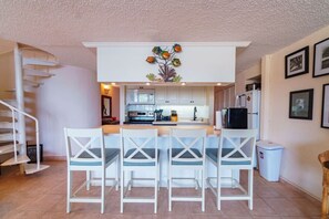 Fridge, coffee/tea maker, cookware/dishes/utensils