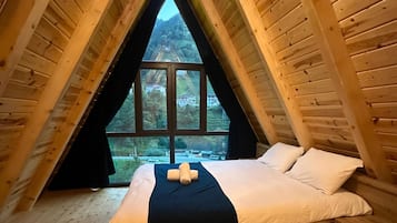 Deluxe Bungalow, 1 Bedroom, Non Smoking, River View | 1 bedroom, Egyptian cotton sheets, premium bedding, down duvets