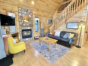 Smart TV, fireplace, DVD player, books