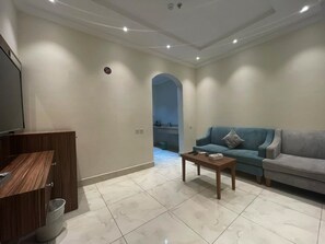 Desk, laptop workspace, free WiFi, bed sheets