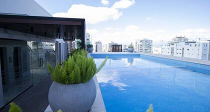 Céntrico con Piscina+bbq+gym+espacio de Trabajo y Personal en el Lobby 24/7