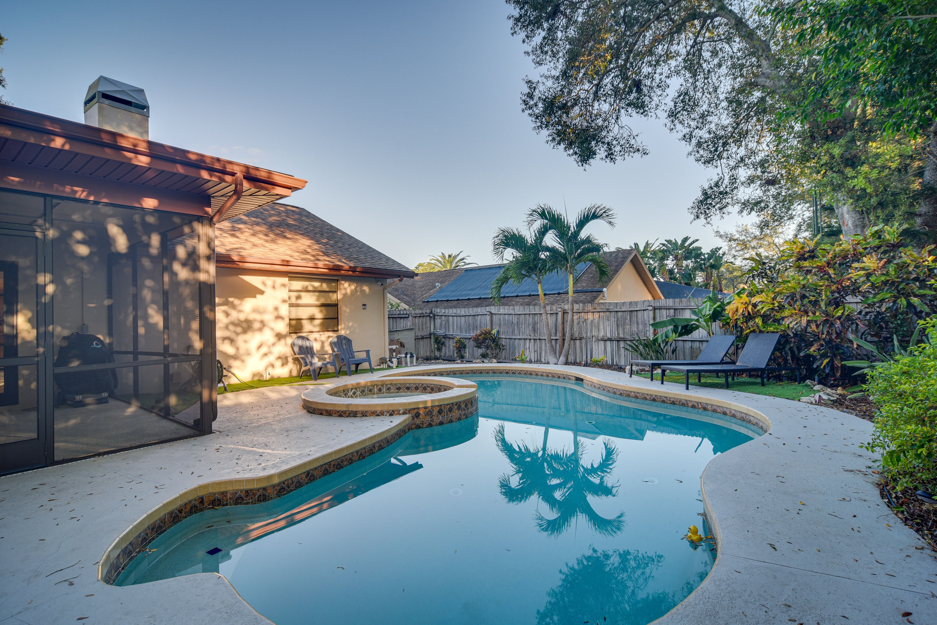 Sunny Palm Harbor Home w/ Private Pool + Hot Tub!