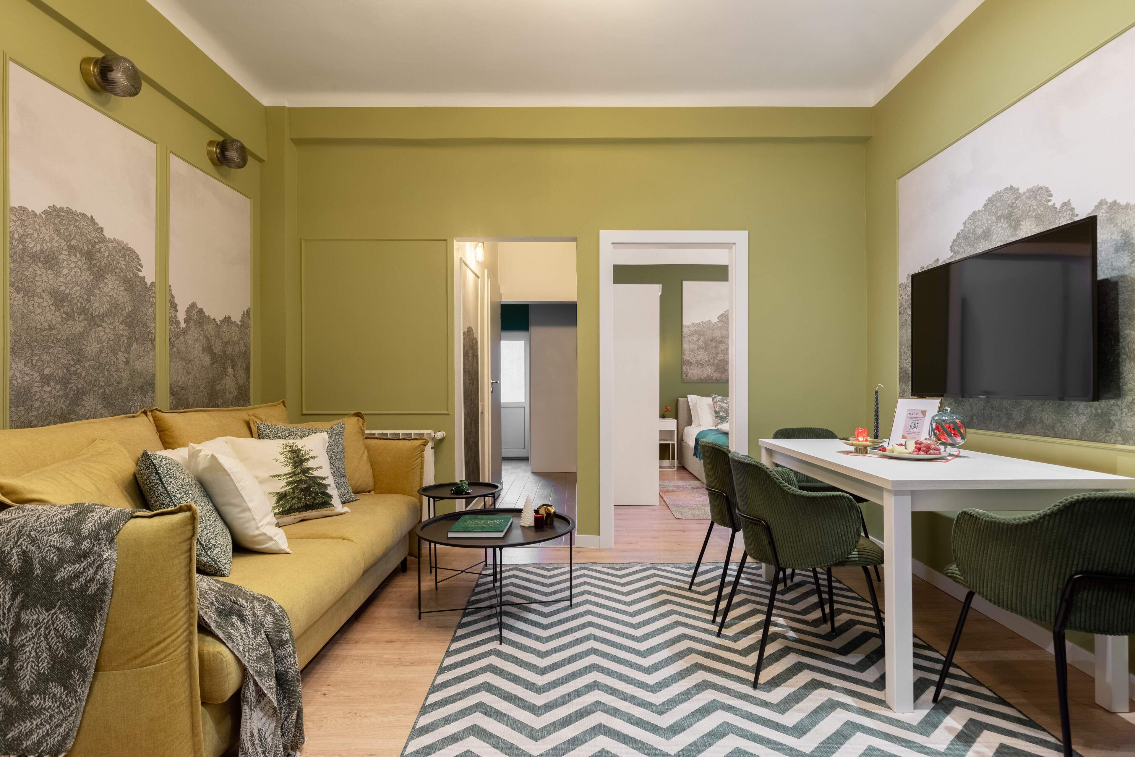 Apartemen Deluks | Area keluarga | Televisi layar datar 42-inci dengan saluran TV kabel dan Netflix