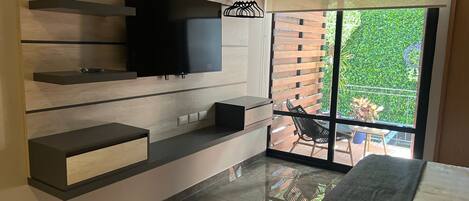 Appartement Confort, 1 grand lit et 1 canapé-lit, dans la tour | Coin séjour