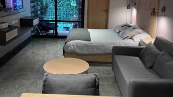 42-inch LCD TV with digital channels, streaming services, offices