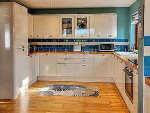 Dishwasher, high chair, cookware/dishes/utensils