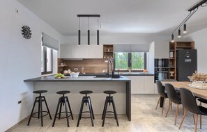 Fridge, microwave, dishwasher, coffee/tea maker
