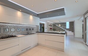 Fridge, microwave, dishwasher, coffee/tea maker