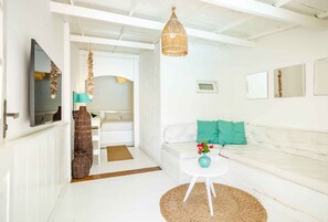 Deluxe Σουίτα, 1 Queen Κρεβάτι | Ηχομόνωση, δωρεάν Wi-Fi, κλινοσκεπάσματα 