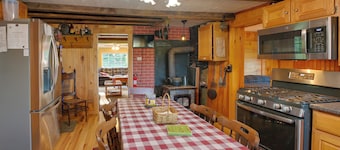 Cozy River Cabin w/ Fishing, Kayaks & ATV Access!