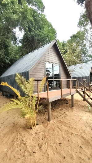 Deluxe Bungalows with Sea Views | Living area | Foosball, video library