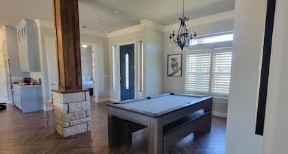 Luxury lake front retreat! Family and pet friendly with fishing access!