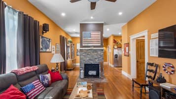Smart TV, fireplace, books, stereo