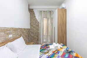 2 chambres, fer et planche à repasser, accès à Internet, literie fournie