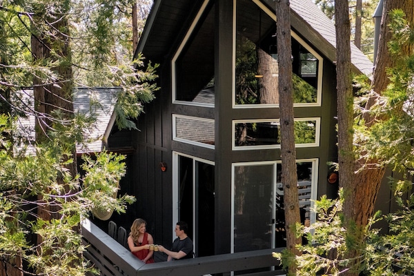 Juniper A-frame cabin is nestled in the pines in Idyllwild, California.