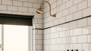 Deluxe Single Room | Bathroom | Shower, designer toiletries, hair dryer, towels