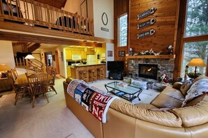 Smart TV, fireplace, DVD player, books