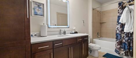 Hair dryer, towels, soap, shampoo