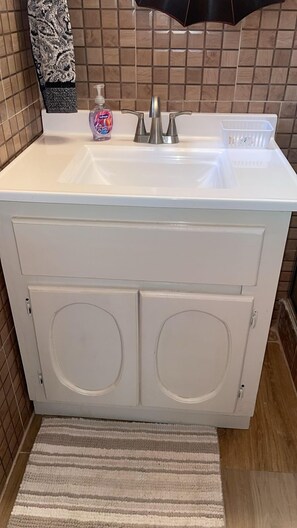 Shower, towels, soap, shampoo