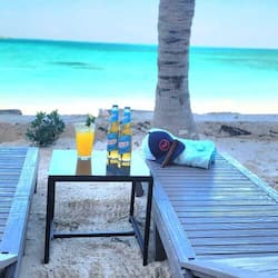 Private beach, white sand, sun loungers, beach umbrellas