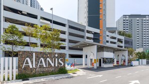 A modern building with a sign reading "ALANIS RESIDENCE". - Alanis Sepang at Klia-Klia2 (Sepang)