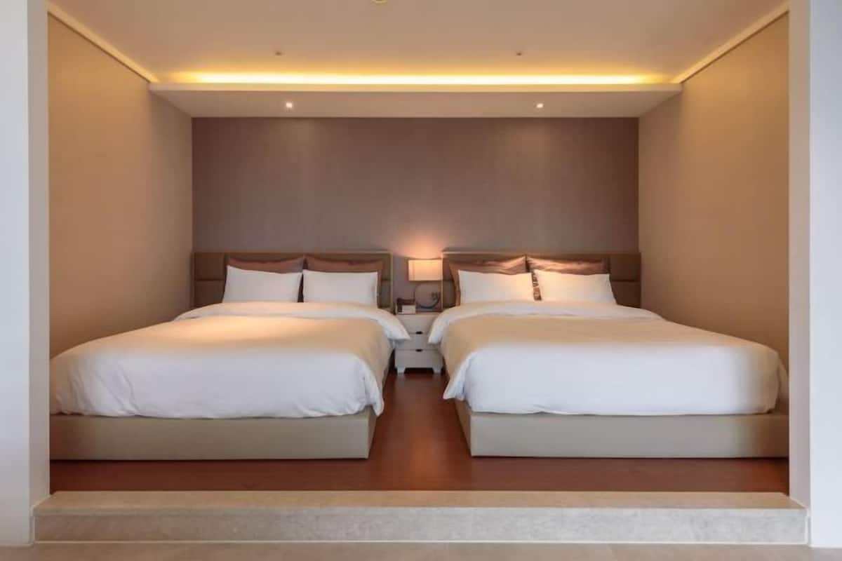 Hypo-allergenic bedding, down duvets, blackout curtains, soundproofing