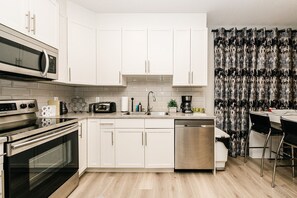 Fridge, microwave, oven, stovetop - Modern Legal suite near Airport, Hospital, South common, Henday, 91 St, Town Ctr (Edmonton)