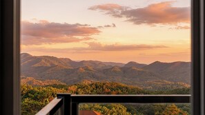 A mountain landscape with a view of the horizon.