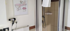 Eco-friendly toiletries, hair dryer, bidet, towels