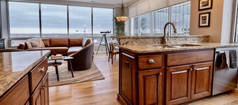 High rise condo living in the middle of it all!