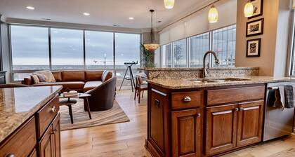 High rise condo living in the middle of it all!