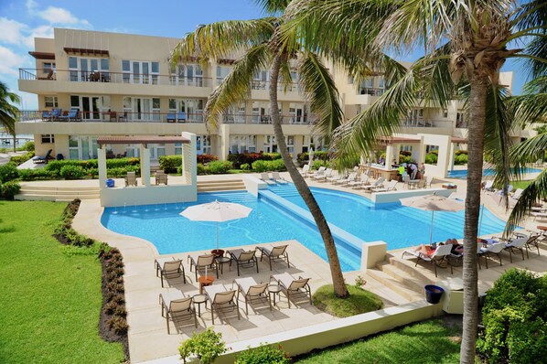 2 outdoor pools, pool umbrellas, pool loungers