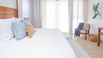 Premium bedding, down comforters, in-room safe, blackout drapes