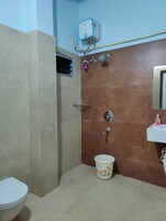 Deluxe Double Room | Bathroom | Slippers
