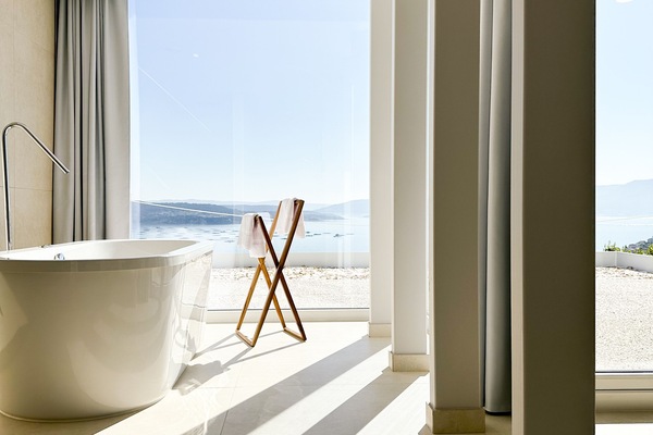 Luxury Room, 1 King Bed, Hot Tub, Sea View | Bathroom | Hair dryer, slippers, towels, soap