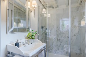 Shower, eco-friendly toiletries, hair dryer, bidet